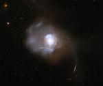 Phát hiện cặp lỗ đen siêu khổng lồ bí ẩn ngoài vũ trụ